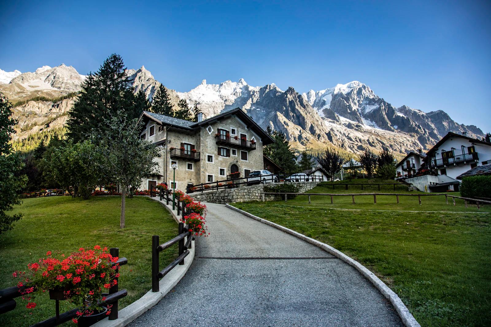Road to a chalet below the Mont Blanc massif on the Italian side